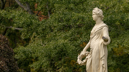 statue of woman in garden