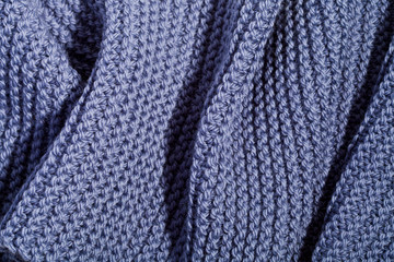 Blue wool knitted scarf.