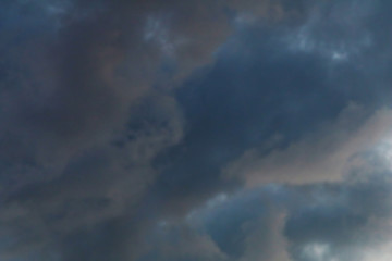 Naklejka na ściany i meble Background of sky with thunderclouds
