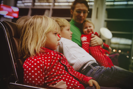 Difficulties In Travel With Kids-angry Unhappy Little Girl Wait In Airport With Family