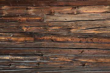 very old wooden surface with knots