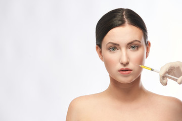 Obraz na płótnie Canvas woman face injection. salon cosmetology procedure. skin medical care. dermatology treatment. anti aging wrinkle lifting