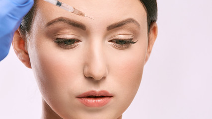 woman face injection. salon cosmetology procedure. skin medical care.  dermatology treatment. anti aging wrinkle lifting