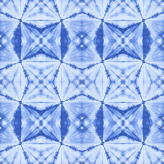 Seamless pattern, abstract tie dyed fabric of indigo color on white cotton. Hand painted fabrics. Shibori dyeing