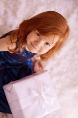 Large gift box. Little sweet girl