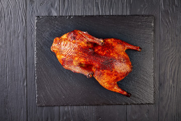 whole grilled duck with crispy skin
