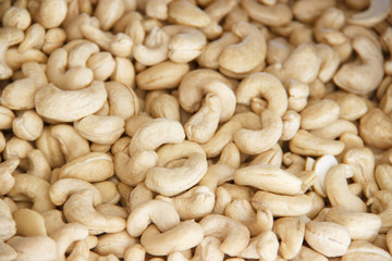 Cashews nut background. kernels of peeled nuts close up