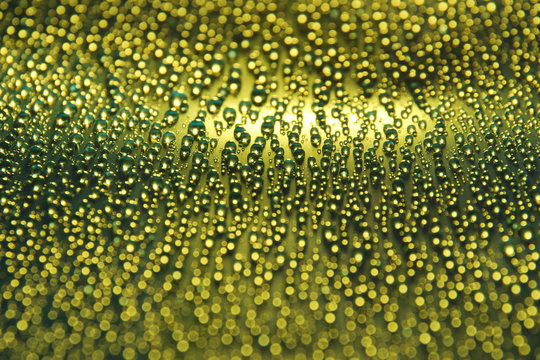 water drops abstract festive gold yellow background