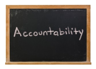 Obraz premium Accountability written in white chalk on a black chalkboard isolated on white