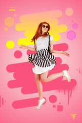 Black and white. Stylish girl wearing black and white dress and sneakers jumping high feeling happy situating near colorful background