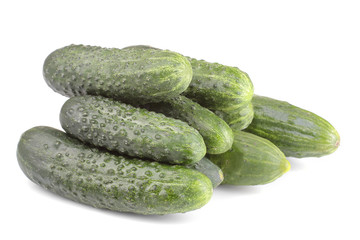 Fresh green cucumbers on white isolated background. Fresh vegetables.