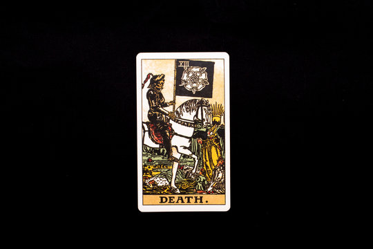 An individual major arcana tarot card isolated on black background. Death.