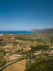Fototapeta premium aerial view of a small Sardinian village surrounded by nature. Italy.