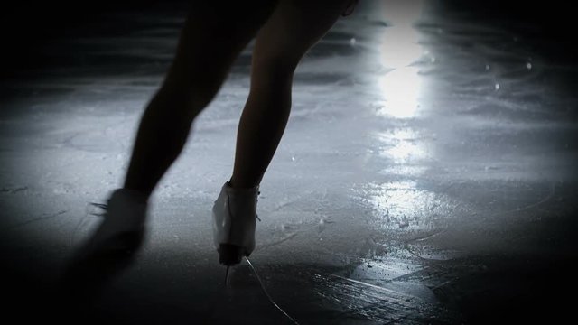 We can see a talented young performer and her white skates.
