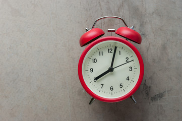 Red alarm clock.