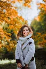 Fototapeta na wymiar Beautiful autumn walk. Happy child