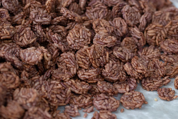 Rice Craker made from rice and then fried with oil until crisp. Fragrant and delicious. Soft focus and blur. (Khao Tan)