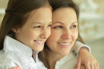 Portrait of happy beautiful woman and girl
