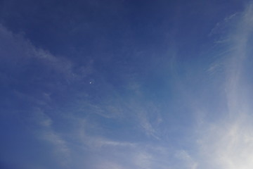 Obraz premium Little moon in blue sky.