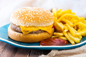 Cheese burger - American cheese burger with Golden French fries