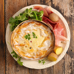 mont d'or, cheese melted with potato and ham