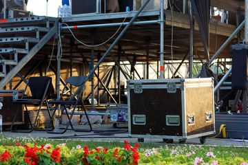 Stage equipment on outdoor stage before concert. Preparing the stage for a concert in the open air