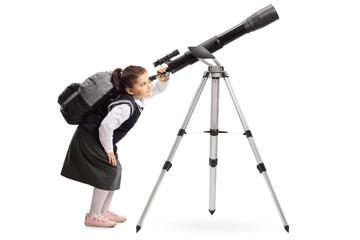 Schoolgirl with a backpack looking through a telescope