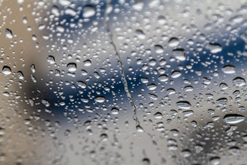 rain drops on car glass, abstract background