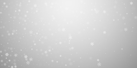 Sparse snowfall Christmas background. Subtle flyin