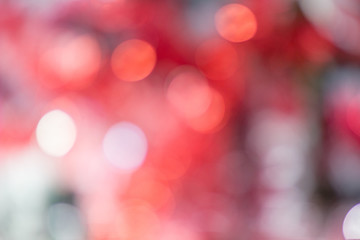 Red blurred christmas and new year glitter background.