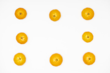 Small tangerines isolated  on white background.