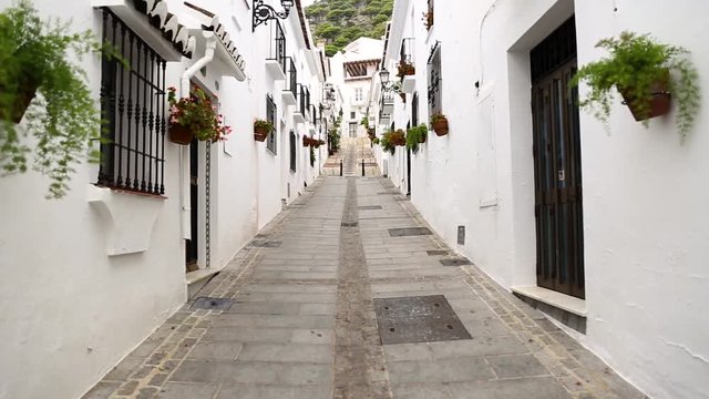 Beautiful view of a typically Spanish street Andalusia Costa del Sol Malaga Mijas Pueblo Spain