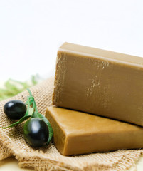 Natural Handmade Olive Soap On The Burlap With Olive Branch. Natural Cosmetics. White Background With Space For Text.