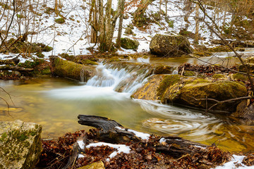The threshold on the river near the waterfall Jur-Jur, winter day, Crimea, Russia
