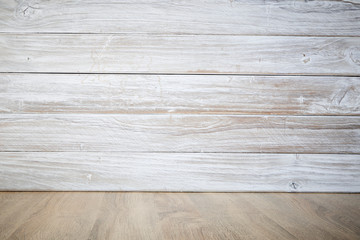 Naklejka premium wooden table with wooden wall