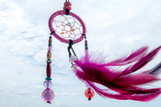 Beautiful dream catcher on sky background