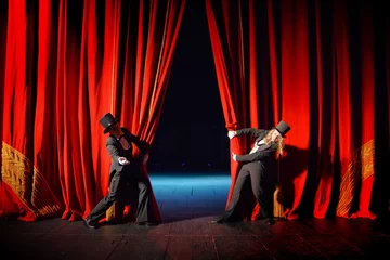 Foto op Aluminium Actors in tuxedos and hats look behind the theater curtain © andrys lukowski