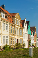 Fototapeta na wymiar Historic facades at the harbor of Glückstadt, Germany