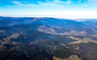 aerial view of black forest mountains on a foggy day