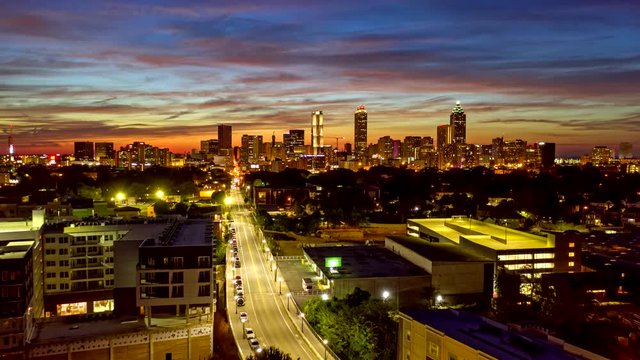 Atlanta Aerial v480 Hyperlapse crossing through cityscape toward downtown at dusk 10/18