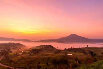 sunrise with mist at the mountain view point