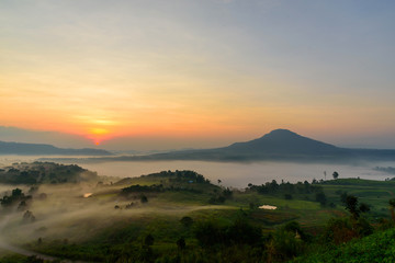 sunrise with mist at the mountain view point