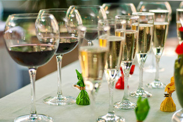 Glass glasses with colored drinks on the table. alcoholic drinks at the buffet