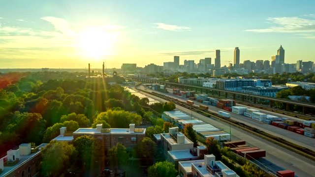 Atlanta Aerial v481 Hyperlapse over cityscape transportation view heading toward setting sun 10/18