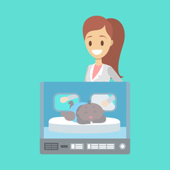 Newborn child in the hospital incubator box