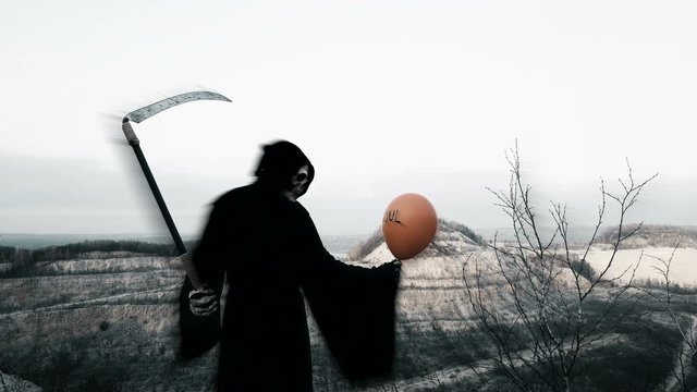 death with a scythe holds a black ball with souls and lets it go, large size