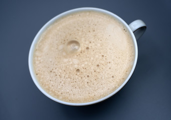 cup of coffee on black background