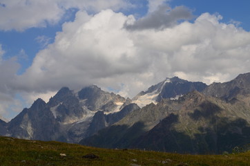Fototapeta premium shadow of clouds on the mountains with glacier