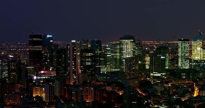 France Paris Aerial v1 Panning slowly around business district at night 8/18