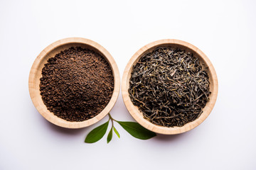 Black Tea Powder or dry dust with or without green leaf and served hot chai in a cup